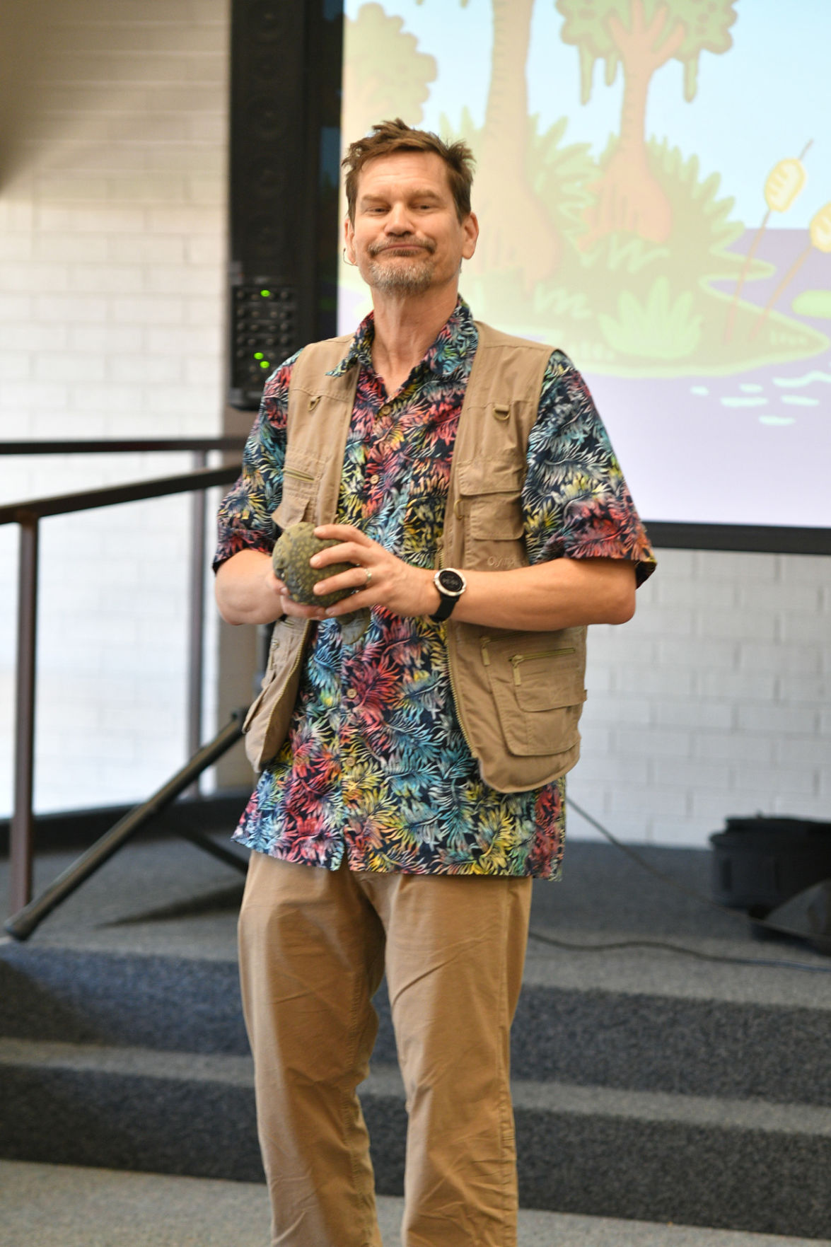 Singing zoologist Lucas Miller visits Bryan library